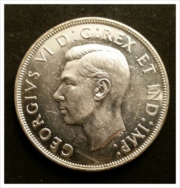 1947-Pointed-7-Canadian-Dollar